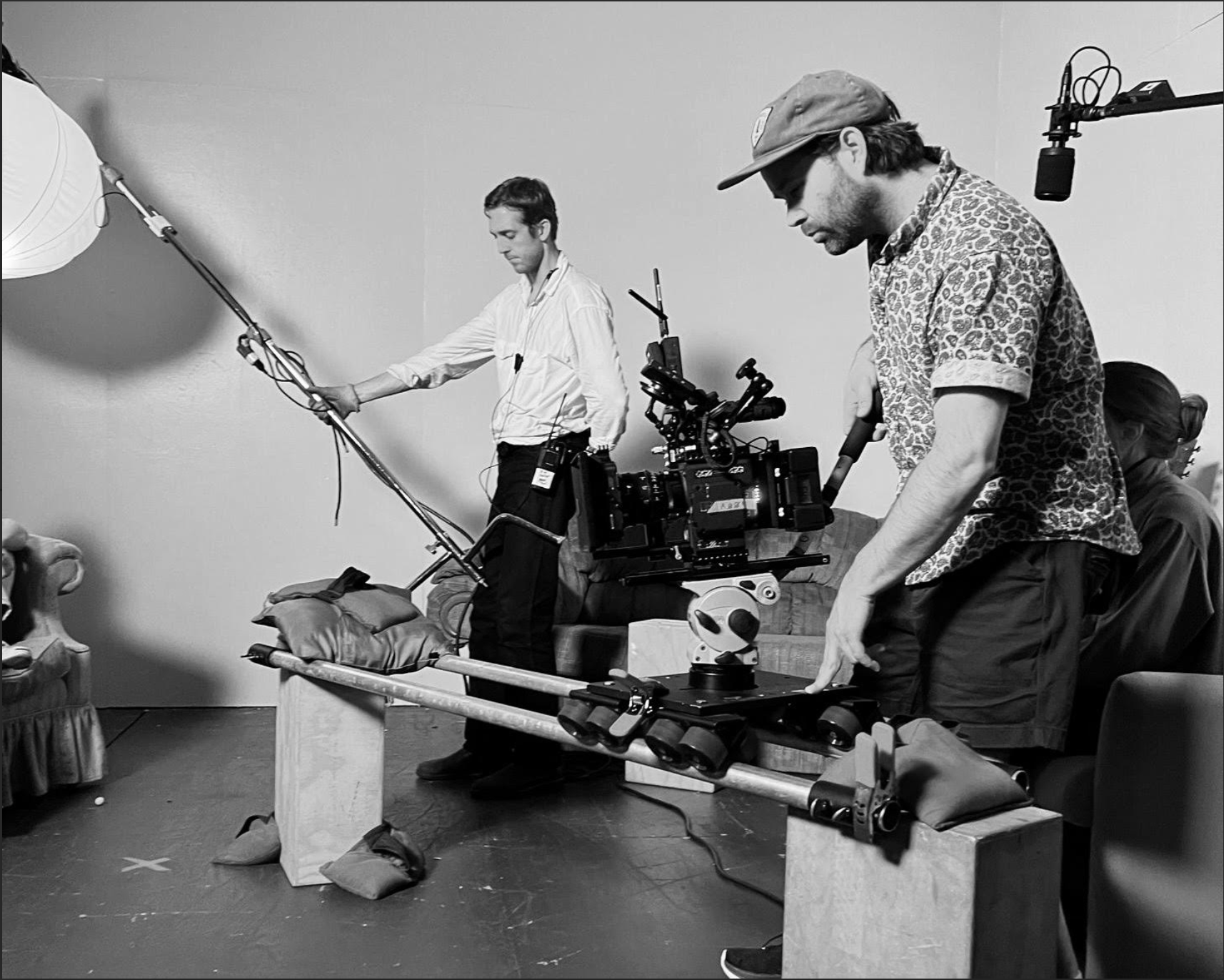 Tyler Beus on set, operating a camera rig